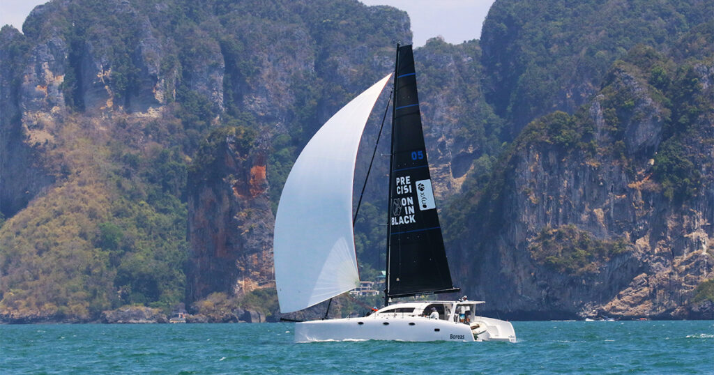 Stealth 11.8 Boreas side profile under sail Bay Regatta Thailand