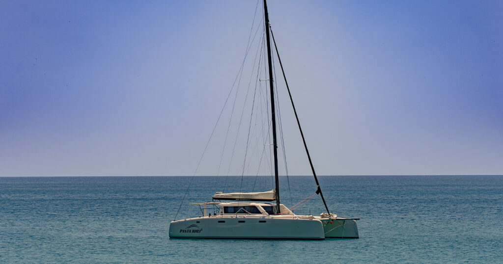 Stealth 13.2 catamaran side profile calm sea