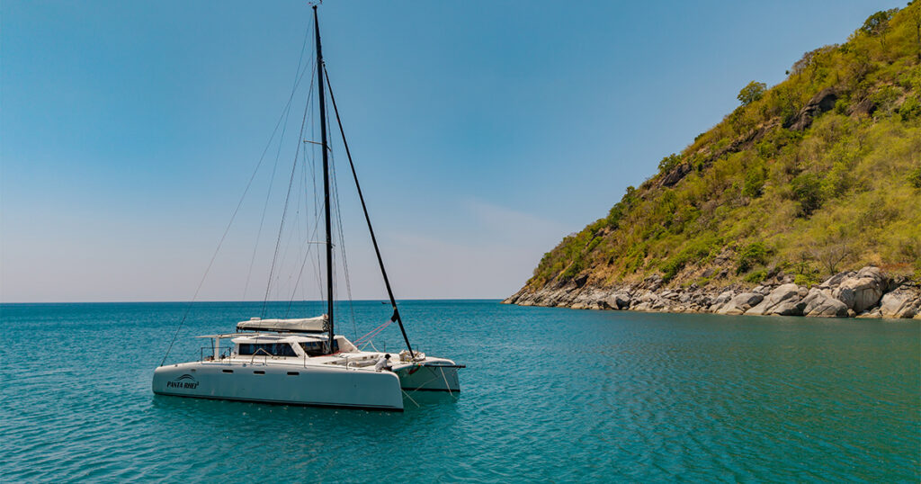 Stealth 13.2 catamaran anchored Phuket bay calm water
