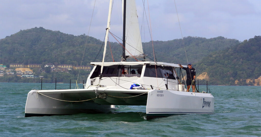 Stealth X Series 43 Zephyrus sailing towards camera in Phuket Bay Regatta Thailand