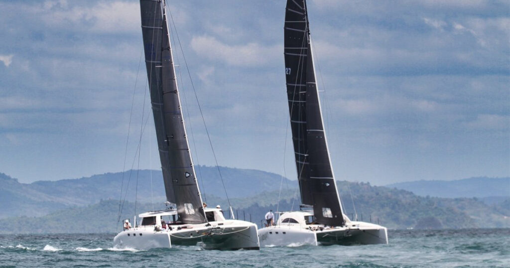 Two Stealth performance catamarans racing side by side at the 2025 Bay Regatta