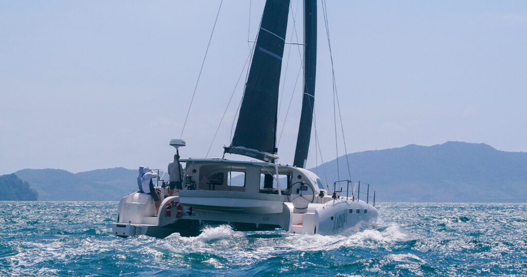 Haruki sailing at speed in moderate seas during the Bay Regatta 2025
