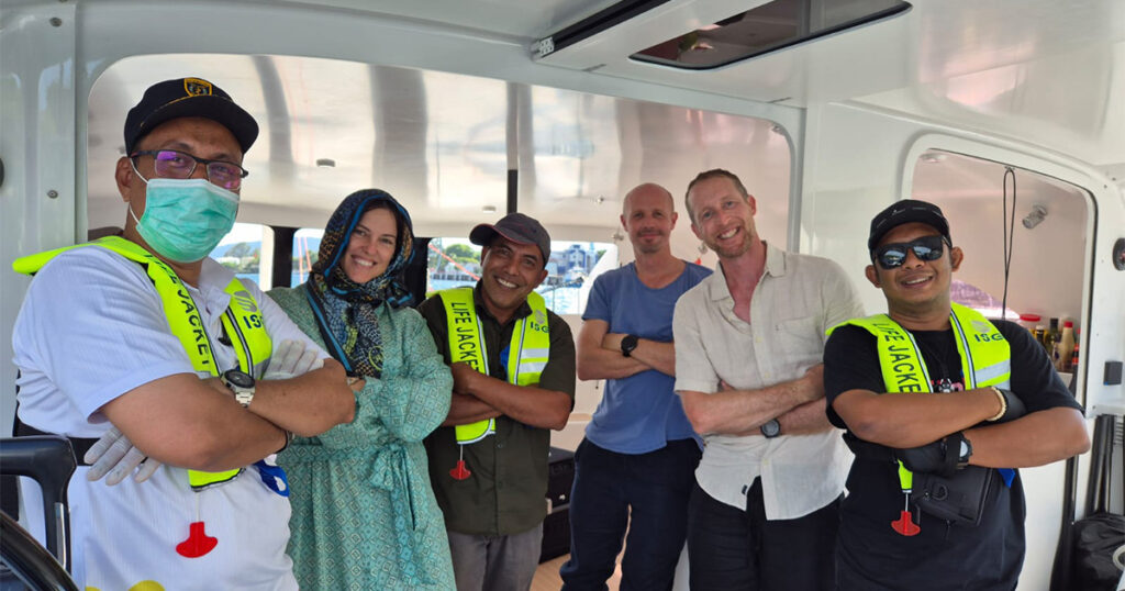 Crew and customs officials onboard Stealth catamaran Haruki during Sumatra clearance