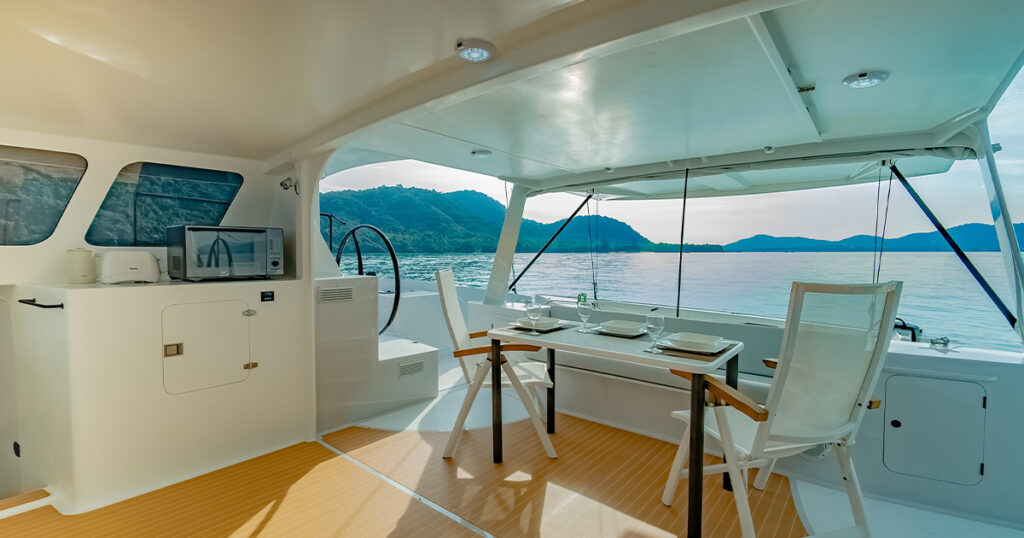 Open cockpit dining area aboard Stealth 13S Bliss 2